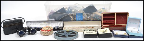 A large collection of costume jewellery to include pearl necklaces, brooches, bracelets, earrings,