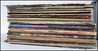 A collection of vinyl long play LP records dating from the 1970's to include Bob Marley, Elton John,