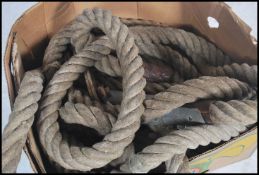 Three sets of vintage 20th century gymnastic gymnasium climbing rope with cast iron pulley wheels