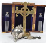 A collection of vintage 20th century ecclesiastical priest items to include two screw top holy water