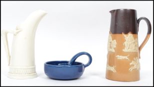 A vintage 20th century Liberties and Co of London blue pottery chamber stick stamped to base along