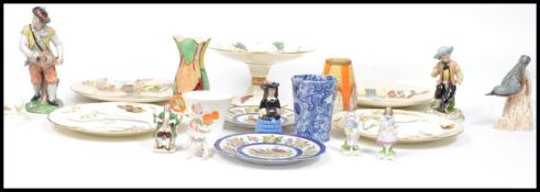 A collection of ceramics to include Minton aesthetic movement ceramic tazza cake stand and 2