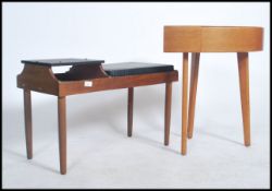 A 1960's retro teak wood telephone hall table with black vinyl upholstered seat together with a