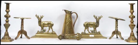 A good collection of brass wares to include a pair of door stops in the form of Stags, 2