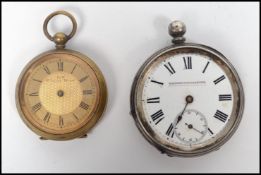 Two vintage 20th century pocket watches, one being a silver 800 stamped example with white enamel