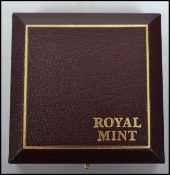 A Royal Mint 1947-1997 United Kingdom Gold Proof Crown celebrating the Golden Wedding Anniversary of
