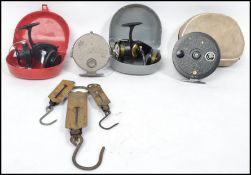 A collection of fishing reels to include a Intrepid Regent, Intrepid Deluxe, Match Aerial, Gemina