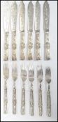 A good set of Victorian silver plated knives and forks. The handles each with Victorian date lozenge