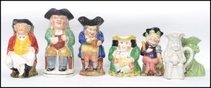 A group of 19th century and other ceramic Toby and character jugs to include Pickwick D242, Malba