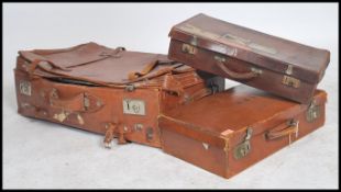 A group of vintage 20th century leather luggage to