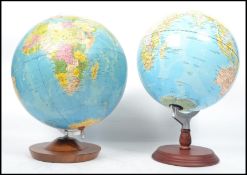 A vintage 20th century retro 1980's Political desk top globe on circular base along with another