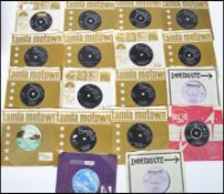 A collection of vintage 45rpm vinyl record singles dating from the 1960s to include many Tamla