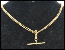 An 18ct gold watch T bar chain marked 18ct , tests 18ct gold. Measures approx 16 inches. Weight 14.