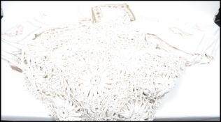 A large quantity of 19th century linens and lace to include large bedspread, embroidered table