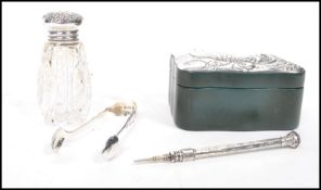 A good group of hallmarked silver items to include a silver topped leather trinket box with an art