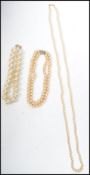 A collection of 3 simulated pearl necklaces, each of graduating form etc ( please see