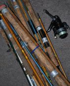 A collection of vintage fishing rods to include Al