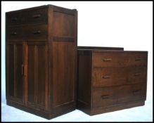 A 1930's utility oak tallboy linen chest cupboard together with a matching chest of drawers being