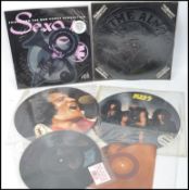 A collection of six retro 20th century music vinyl picture disc records to include Genesis, Marc