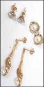 Three pairs of 9ct gold earrings to include a pair of cultured pearl stud earrings, cubic ziconia