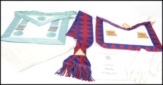 A collection of vintage 20th century Masonic Masons items to include apron, gloves, etc. Please