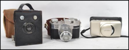 A vintage mid 20th century cased Comet 5 35mm camera together with a vintage cased brownie Jnr and