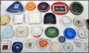 A collection of vintage 20th century advertising point of sale breweriana ashtrays to include