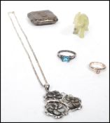 A ladies silver and abalone necklace together with a brass compact, a jade elephant and 2 decorative