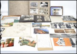 A collection of postcards and pictures dating back to the early 20th century to include vistas