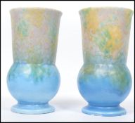 A pair of 1930's Art Deco Beswick vases having drip glaze design with impressed no's to base 96.