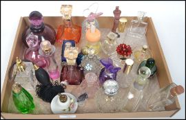 A group of over 50 20th century perfume bottles of