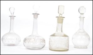 A collection of vintage decanters to include 3 19th century globe and spire, 2 with blown