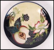 A Moorcroft Trial Piece ceramic tube lined pin dish coaster decorated in the Apple and Blackberry