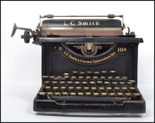 A vintage early 20th century L. C Smith & Corona Super Speed typewriter, retaining original decals.