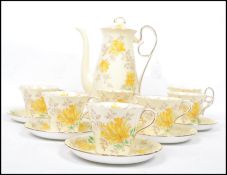 A vintage 20th century Shelley china six person ceramic coffee service consisting of tall coffee