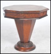 A Victorian work box with octagonal top and faceted trumpet form body, paper lined interior, in need
