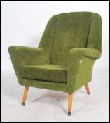 A vintage mid century 1950's armchair of continental French / Italian design in the manner of Ernest