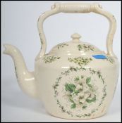 A large 20th century ceramic cream glaze cauldron