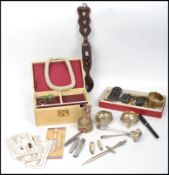 A collection of vintage 20th century curios to include silver plate, costume jewellery, various