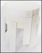 A Retro 20th century / 1970's plastic trio nest of stacking tables of Italian original in the manner