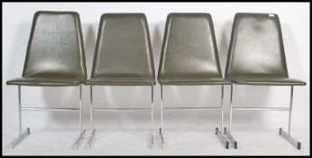 A set of four vintage 20th century Merrow Associate chairs of chrome tubular construction having