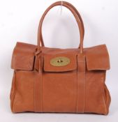 An iconic Oak Natural leather Mulberry Bayswater bag. The bag having brass components with classic