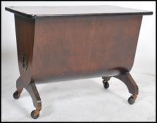 A 1950's walnut cased hoover complete with the original tools. The walnut case with shaped body