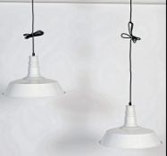 A pair of retro / vintage industrial style factory pendant of enamel metal in the UFO style. both in