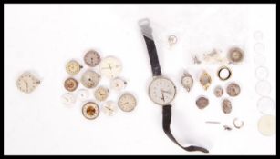 A collection of vintage 20th wristwatch watch movements faces and spares, to include Lewa, Smiths,