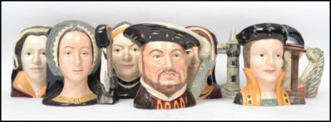 A 20th century Royal Doulton set of character jugs Henry VIII and his wife's comprising Henry VIII
