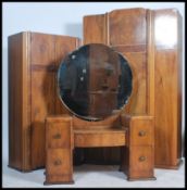 A good Walnut 1930s Art Deco three piece bedroom suite consisting of a matching double and single