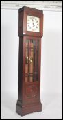 A 1920's tall oak cased longcase clock / grandfather clock with 31 day Westminster chime movement.