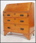 An early 20th century satin wood writing bureau, on bracket legs with bank of drawers beneath fall