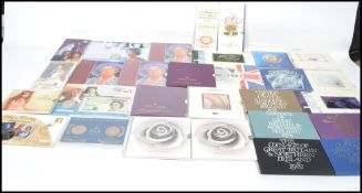 A large collection of Royal Mint uncirculated coins in packets to include coinage proof sets 1978-82